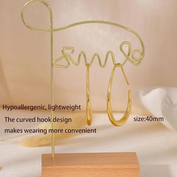 Anthropologie Sculpted Gold Drop Shaped Hoop Earrings - Picture 2 of 2